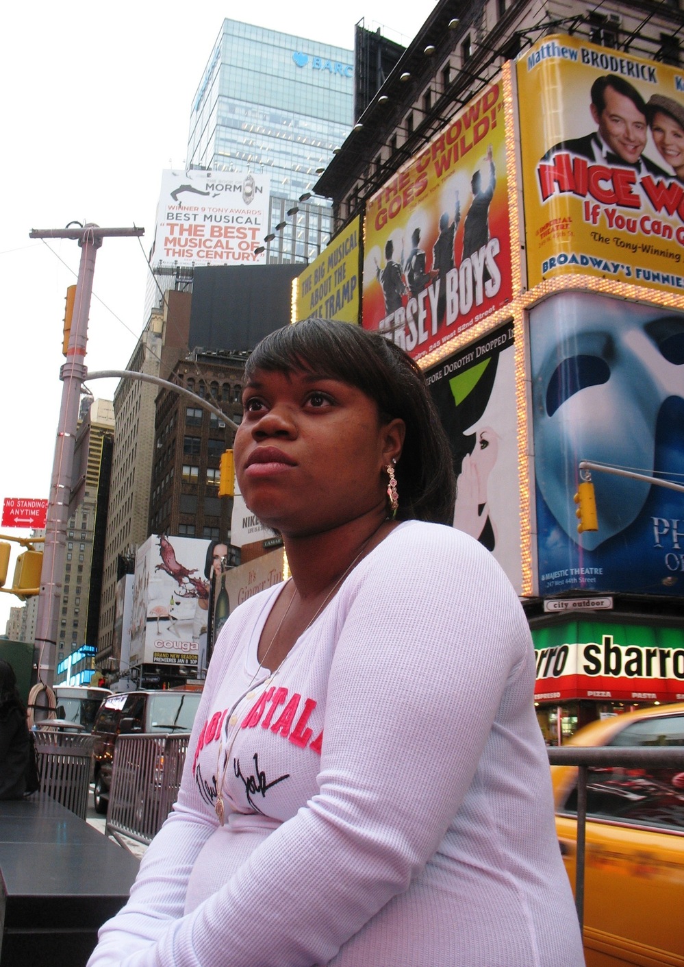 Natisha Laws near her hotel in the middle of Times Square. She and her family were placed at the DoubleTree in mid-November by FEMA. They lost their rental apartment during Superstorm Sandy and have been struggling to recover.