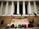Opponents demonstrate against the Supreme Court's Citizens United ruling at the Lincoln Memorial in October. The decision changed campaigning, but it apparently didn't make ads more fact-based. Opponents demonstrate against the Supreme Court's Citizens United ruling at the Lincoln Memorial in October. The decision changed campaigning, but it apparently didn't make ads more fact-based.