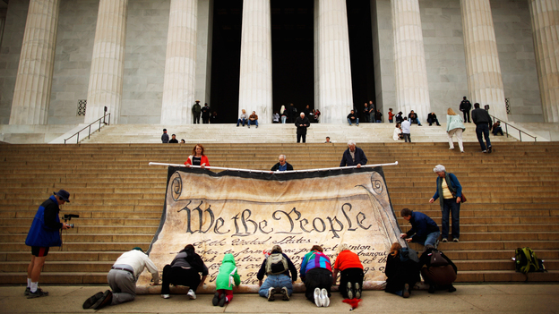 Opponents demonstrate against the Supreme Court's Citizens United ruling at the Lincoln Memorial in October. The decision changed campaigning, but it apparently didn't make ads more fact-based.