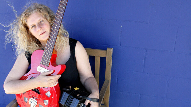 Musician Kristina Olsen says Tibetan prayer flags flying over porches near her home in Venice, Calif., became the inspiration for a song.