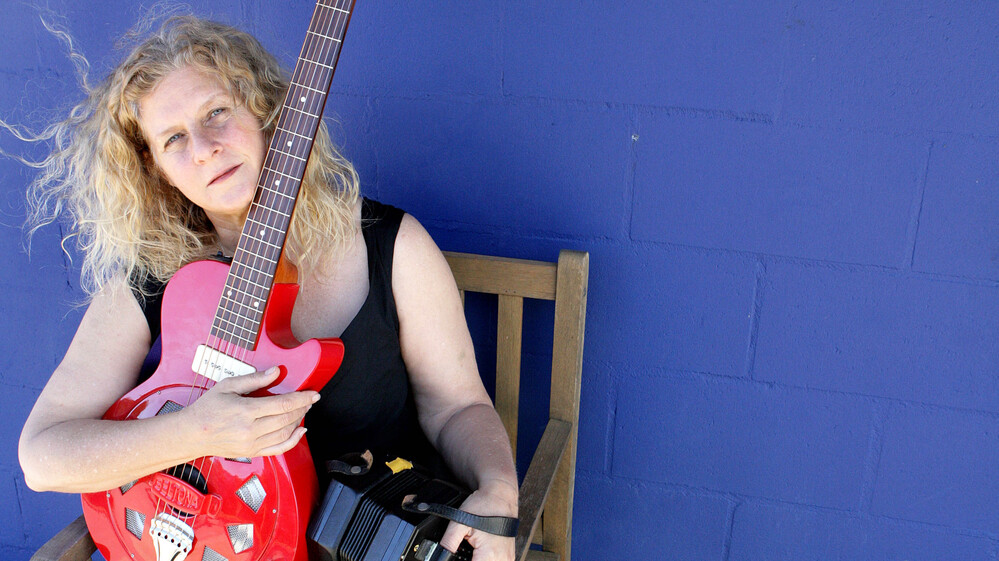 Musician Kristina Olsen says Tibetan prayer flags flying over porches near her home in Venice, Calif., became the inspiration for a song.