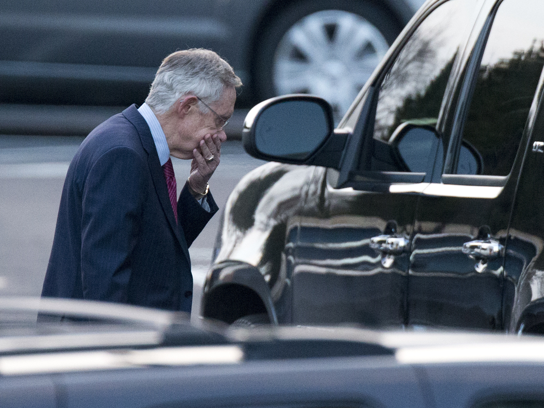 Senate Majority Leader Harry Reid of Nevada leaves the White House after a closed-door meeting with the president and congressional leaders.