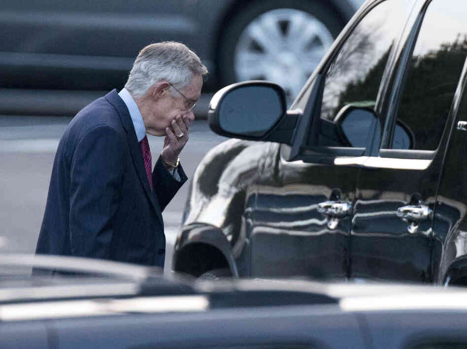Senate Majority Leader Harry Reid of Nevada leaves the White House after a closed-door meeting with the president and congressional leaders.