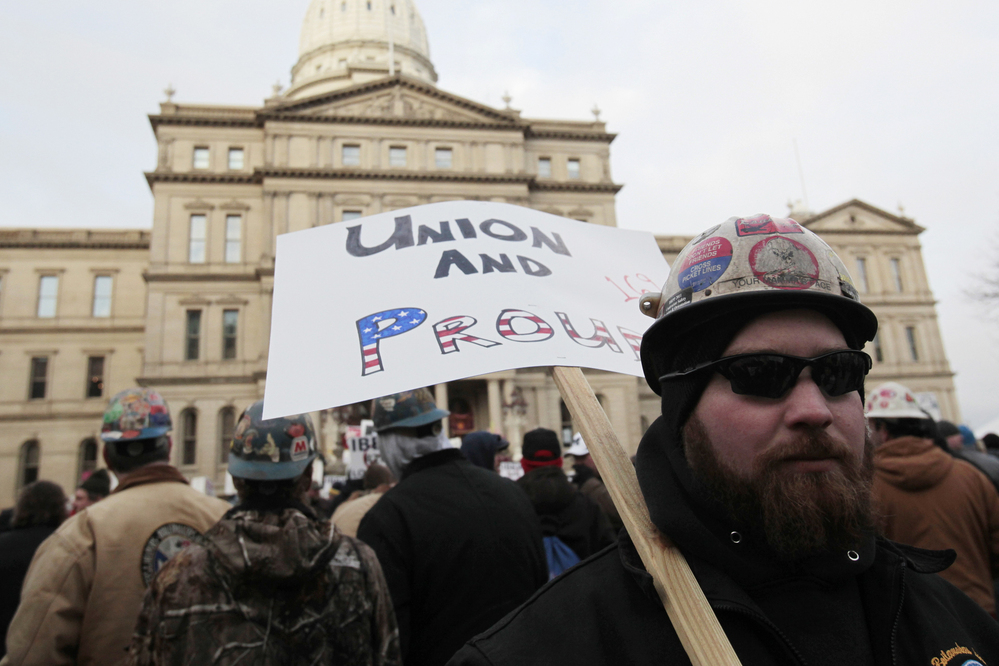 Despite huge protests at Michigan's state capitol building in Lansing, Republican lawmakers in the state made the union stronghold the 24th right-to-work state in the country. Despite huge protests at Michigan's state capitol building in Lansing, Republican lawmakers in the state made the union stronghold the 24th right-to-work state in the country.