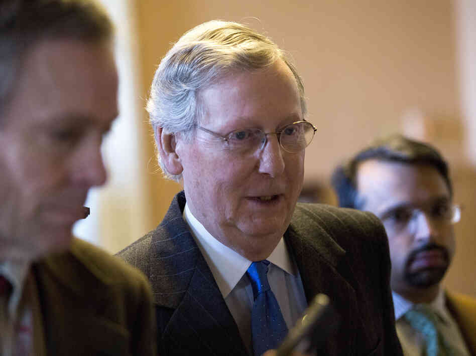 Senate Minority Leader Mitch McConnell walks toward his office on Capitol Hill Sunday. The House and Senate are both in session to deal with the looming "fiscal cliff" issue. Senate Minority Leader Mitch McConnell walks toward his office on Capitol Hill Sunday. The House and Senate are both in session to deal with the looming "fiscal cliff" issue.