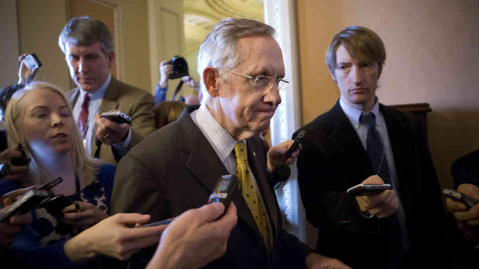 Senate Majority Leader Harry Reid, D-Nev., walks to a closed-door meeting with fellow Democrats at the Capitol on Sunday.
