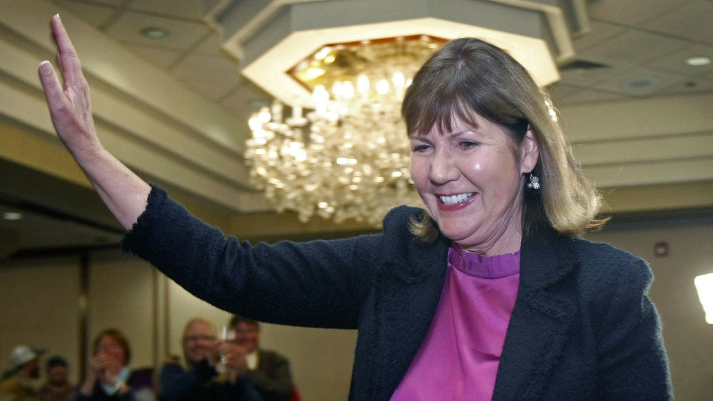 Rep.-elect Ann Kirkpatrick, D-Ariz., enters a room full of supporters on Election Day, Nov. 6, in Flagstaff, Ariz.
