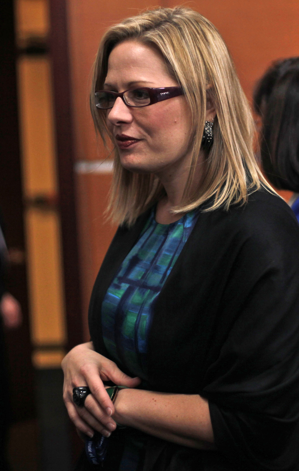 Rep.-elect Kyrsten Sinema, D-Ariz., appears at a news conference with newly elected Democratic House members in Washington on Nov. 13.