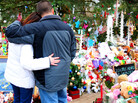 Remembering the victims: Earlier this month, two mourners paused at a makeshift memorial in Newtown, Conn., for the children and adults killed at Sandy Hook Elementary School. Remembering the victims: Earlier this month, two mourners paused at a makeshift memorial in Newtown, Conn., for the children and adults killed at Sandy Hook Elementary School.