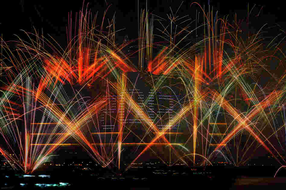 Fireworks explode over Victoria Harbor in Hong Kong.
