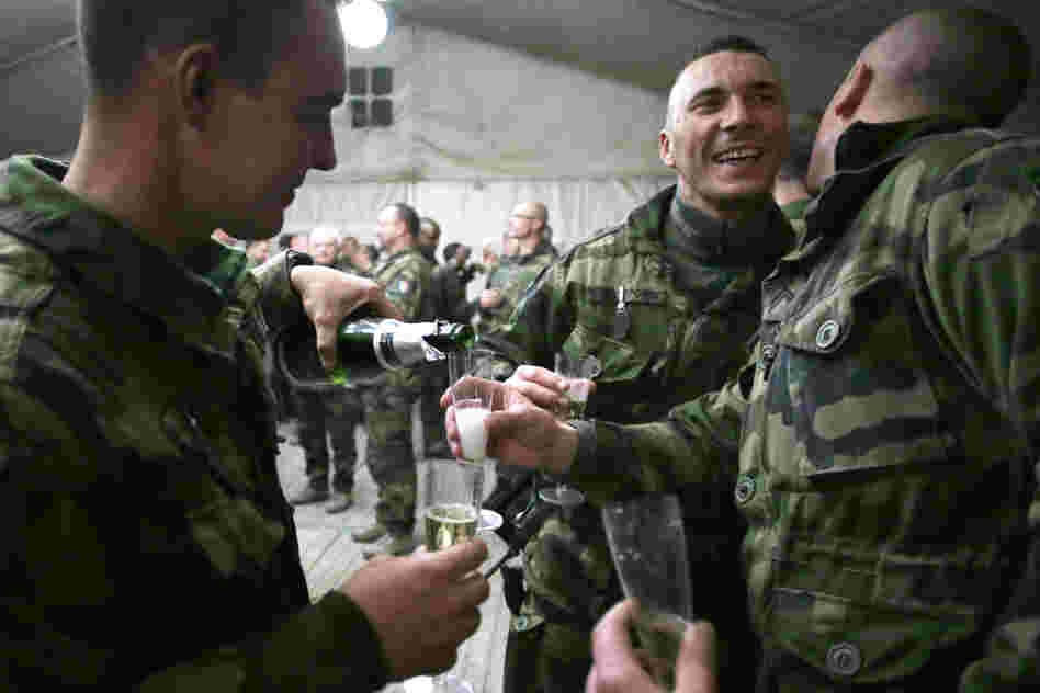 French soldiers celebrate the New Year's Eve at Warehouse base in Kabul.