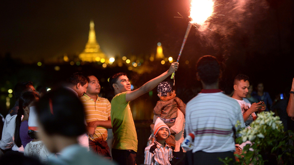 Revelers count down to 2013 near the Shwedagon Pagoda in Yangon, Myanmar, where thousands gathered for the city's first public countdown to the New Year.