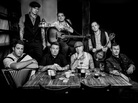 "Rose Tattoo," by the Irish punk band Dropkick Murphys, memorializes the grandfather of singer and bassist Ken Casey (left of center, at table). "Rose Tattoo," by the Irish punk band Dropkick Murphys, memorializes the grandfather of singer and bassist Ken Casey (left of center, at table).