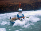 Waves crash over the Kulluk oil rig, which washed aground on Sitkalidak Island, Alaska. Officials say aircraft have not spotted any signs of a fuel leak from the rig, which reportedly does not contain crude oil. Waves crash over the Kulluk oil rig, which washed aground on Sitkalidak Island, Alaska. Officials say aircraft have not spotted any signs of a fuel leak from the rig, which reportedly does not contain crude oil.