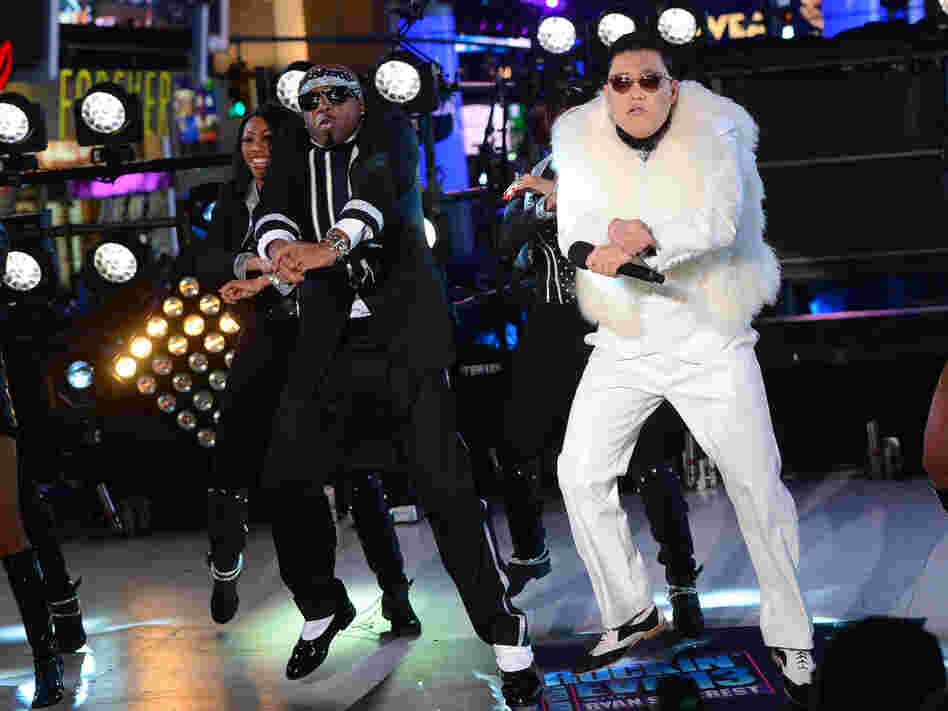 South Korean singer PSY performs with US singer MC Hammer during New Year's Eve celebrations in Times Square in New York.