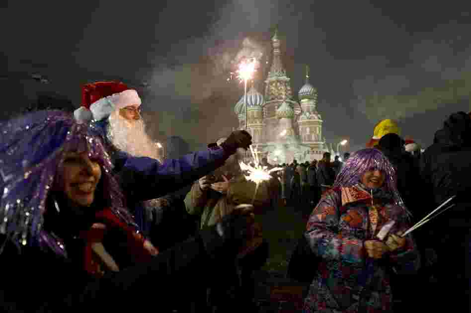 People celebrate the New Year in front of St. Basil's Cathedral on Moscow's Red Square.