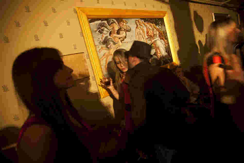 Russian-speaking Israelis mingle at the Soho nightclub in Tel Aviv. The club caters to the Russian-speaking immigrant community, featuring hired dancers and extravagant decorations rarely seen in informal Israel.