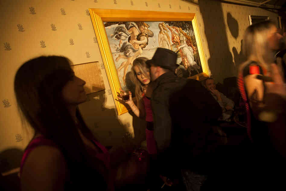 Russian-speaking Israelis mingle at the Soho nightclub in Tel Aviv. The club caters to the Russian-speaking immigrant community, featuring hired dancers and extravagant decorations rarely seen in informal Israel.