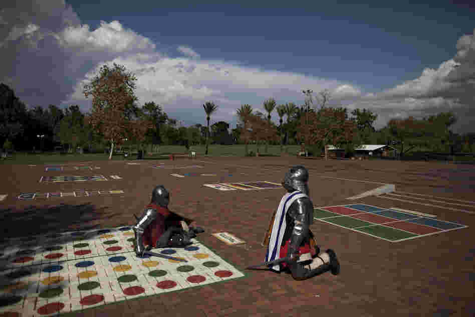 Immigrants from the former Soviet Union practice sword-fighting in full knight armor at a public park in Ramat Gan, central Israel. Medieval combat simulation is popular in ex-Soviet countries, and some immigrants have continued the hobby in Israel.