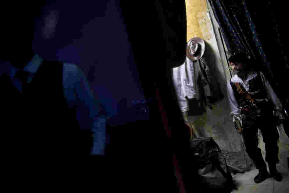 Acrobats wait in a dressing room before their show at L'Chaim, a Russian restaurant in Ashdod. Many circus performers in Israel emigrated from the former Soviet Union, and acrobatic shows are a unique feature of Russian restaurants in Israel.