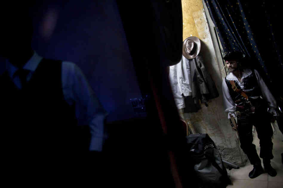 Acrobats wait in a dressing room before their show at L'Chaim, a Russian restaurant in Ashdod. Many circus performers in Israel emigrated from the former Soviet Union, and acrobatic shows are a unique feature of Russian restaurants in Israel.