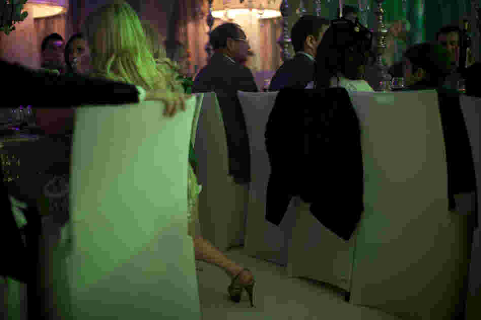 People attend a 2011 New Year's party catering to the upper crust of Israel's Russian-speaking immigrant community, in Tel Aviv.