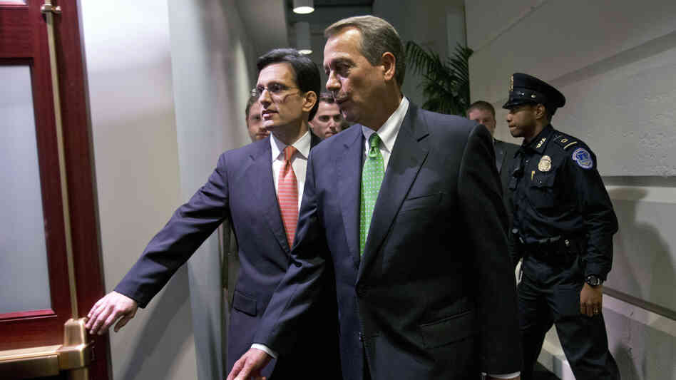 House Speaker John Boehner, R-Ohio (right), and Majority Leader Eric Cantor, R-Va., enter a Republican caucus meeting at the U.S. Capitol on Tuesday.