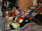 The day after their neighborhood was flooded, the Hardys returned to their house to start bagging up the garbage. The contents of the fridge were spread all over the kitchen floor and even outside. There were sausages in the street. The kitchen floor was a mess of muddy puddles. The day after their neighborhood was flooded, the Hardys returned to their house to start bagging up the garbage. The contents of the fridge were spread all over the kitchen floor and even outside. There were sausages in the street. The kitchen floor was a mess of muddy puddles.