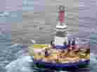 A Coast Guard helicopter crew conducts the 13th hoist of 18 crewmen from the mobile drilling unit Kulluk on Saturday, Dec. 29, 2012, 80 miles southwest of Kodiak City, Alaska. On Monday, the Kulluk ran aground on Sitkalidak Island. A Coast Guard helicopter crew conducts the 13th hoist of 18 crewmen from the mobile drilling unit Kulluk on Saturday, Dec. 29, 2012, 80 miles southwest of Kodiak City, Alaska. On Monday, the Kulluk ran aground on Sitkalidak Island.