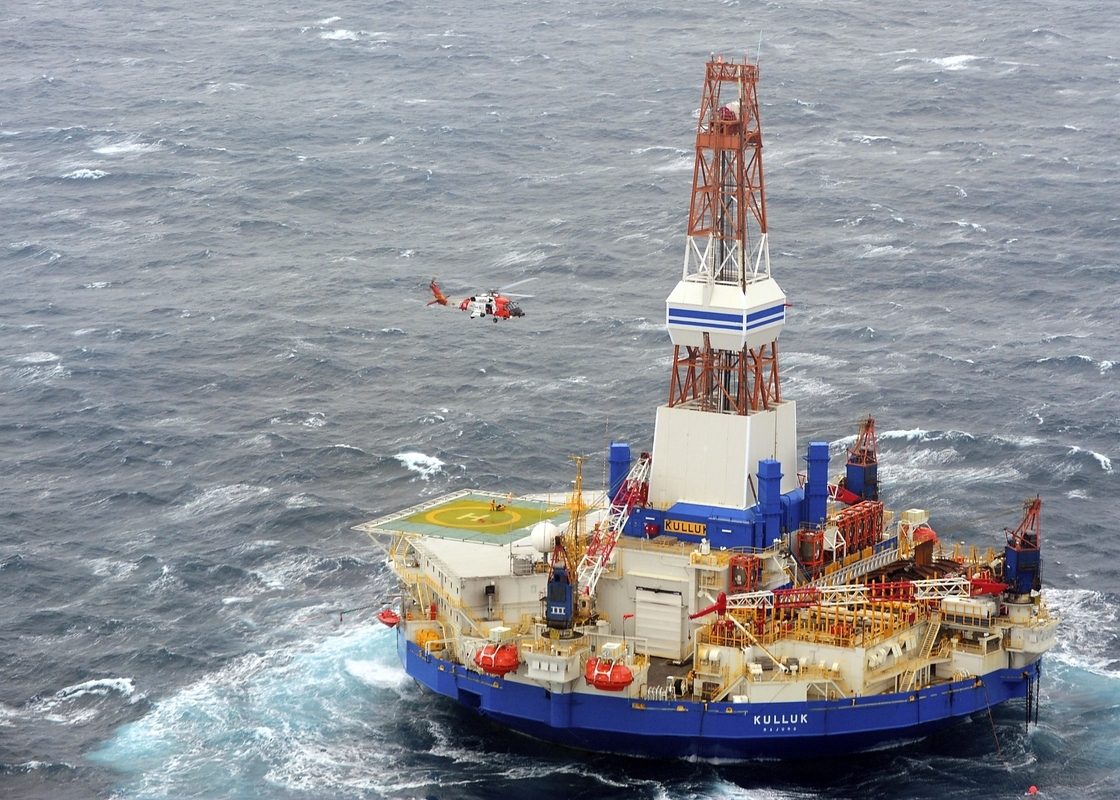 A Coast Guard helicopter crew conducts the 13th hoist of 18 crewmen from the mobile drilling unit Kulluk on Saturday, Dec. 29, 2012, 80 miles southwest of Kodiak City, Alaska. On Monday, the Kulluk ran aground on Sitkalidak Island.