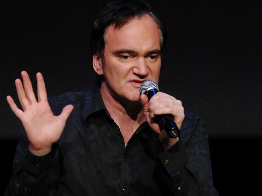 Writer-director Quentin Tarantino, seen here at a 2009 screening of Inglourious Basterds, tells Terry Gross that the only film violence that truly disturbs him involves actual harm to animals.