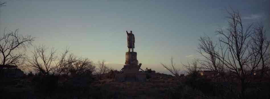 A statue of Vladimir Lenin stands alone in the abandoned military settlement outside Priozersk, Kazakhstan, June 2011. There were some residential buildings around the statue, but all of the residents left the small military settlement after the Soviet collapse.