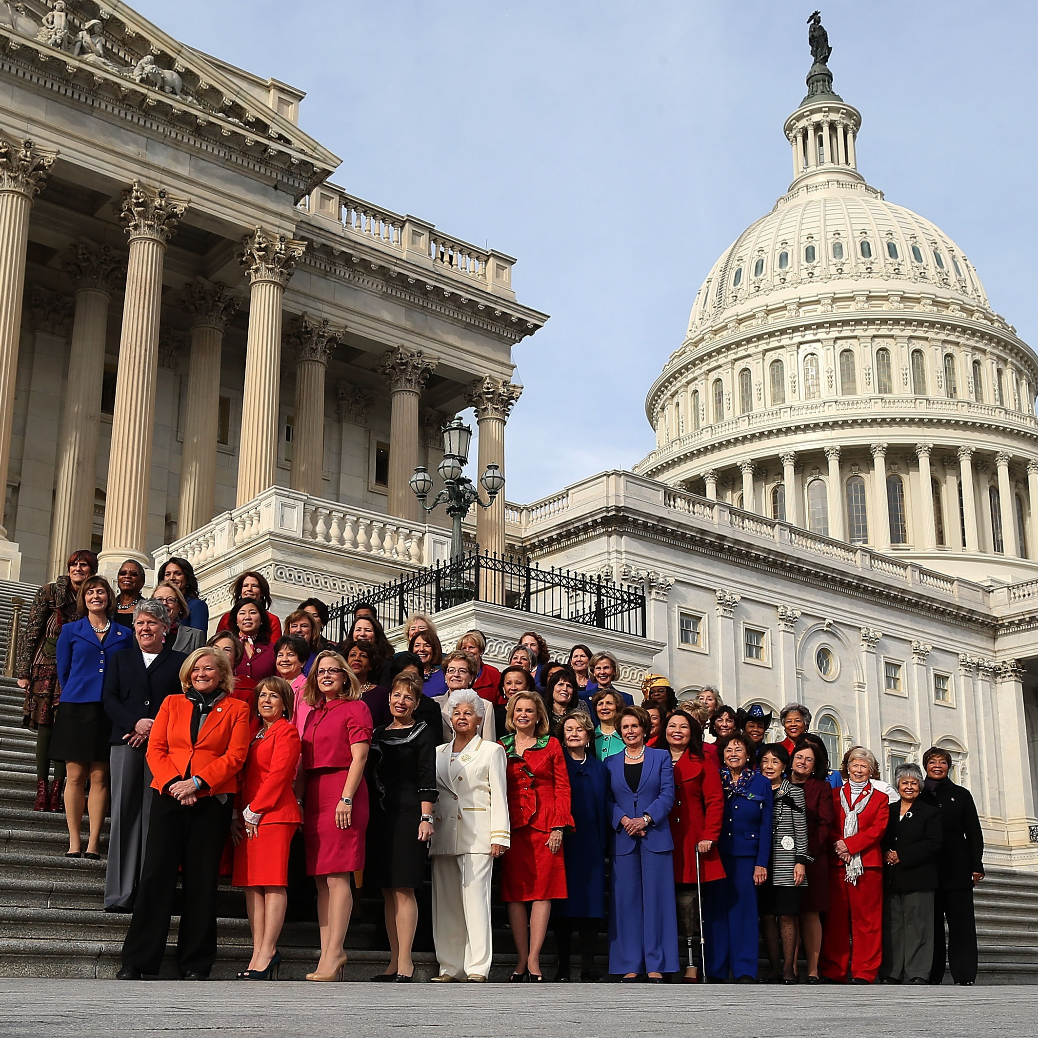 Democratic leader Nancy Pelosi of California (front row, right-center) and other female members of the House gathered outside the Capitol earlier today.
