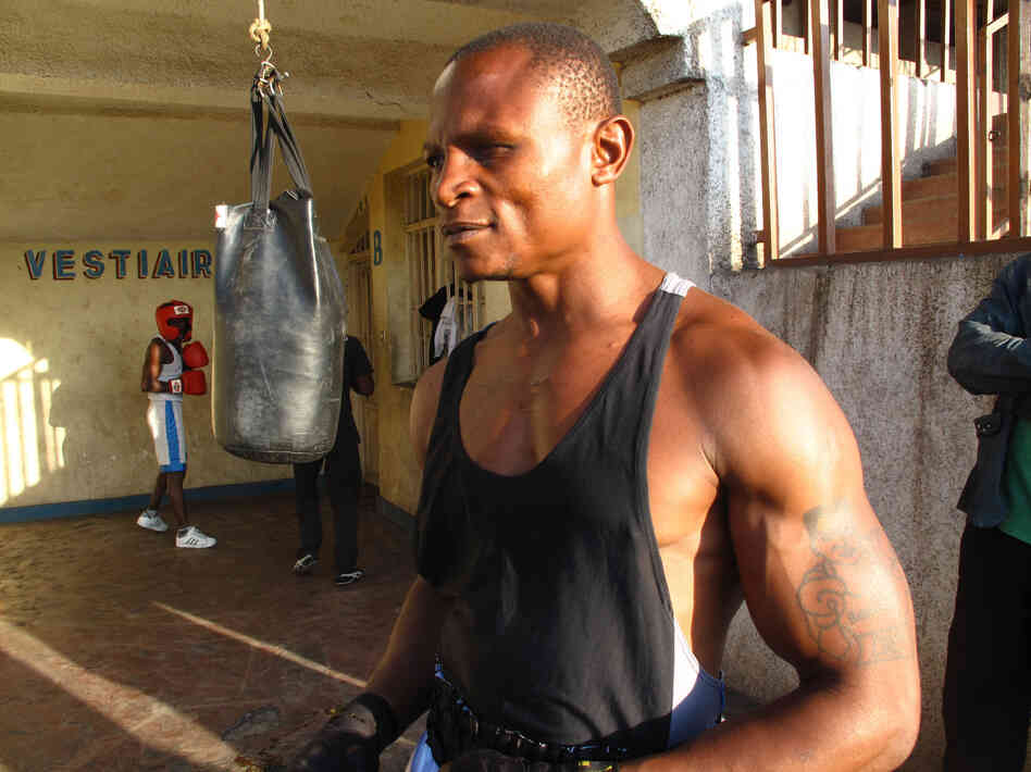 Balezi Bagunda, who boxes under the name "Kibomango," lost one eye while fighting in a rebel militia he joined as a child. Now he trains other former child soldiers and street boys in the art of boxing and automobile mechanics.