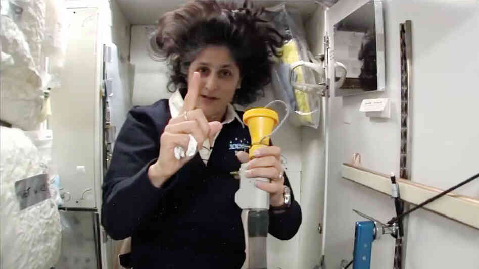 Williams explains how astronauts use the bathroom in a weightless environment.