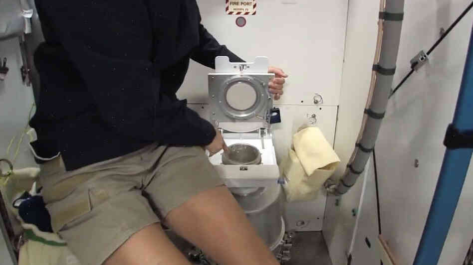 Using the bathroom is tricky in space.  Williams explains how it works.