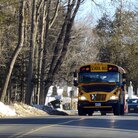Early Thursday morning, a school bus carrying students from Sandy Hook Elementary headed to their new school.