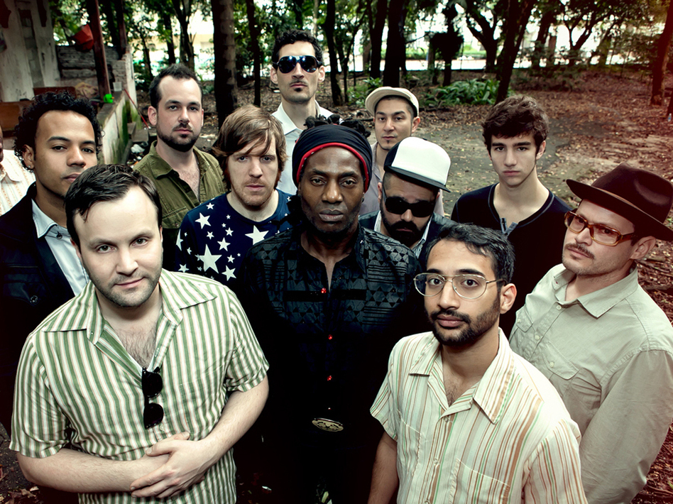 Antibalas was founded in 1998 by baritone sax player Martin Perna (far right, in hat) and is fronted by singer-percussionist Amayo (center, in head wrap). The group has seen many lineup changes in its decade and a half together. Antibalas was founded in 1998 by baritone sax player Martin Perna (far right, in hat) and is fronted by singer-percussionist Amayo (center, in head wrap). The group has seen many lineup changes in its decade and a half together.