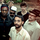 Antibalas was founded in 1998 by baritone sax player Martin Perna (far right, in hat) and is fronted by singer-percussionist Amayo (center, in head wrap). The group has seen many lineup changes in its decade and a half together. Antibalas was founded in 1998 by baritone sax player Martin Perna (far right, in hat) and is fronted by singer-percussionist Amayo (center, in head wrap). The group has seen many lineup changes in its decade and a half together.