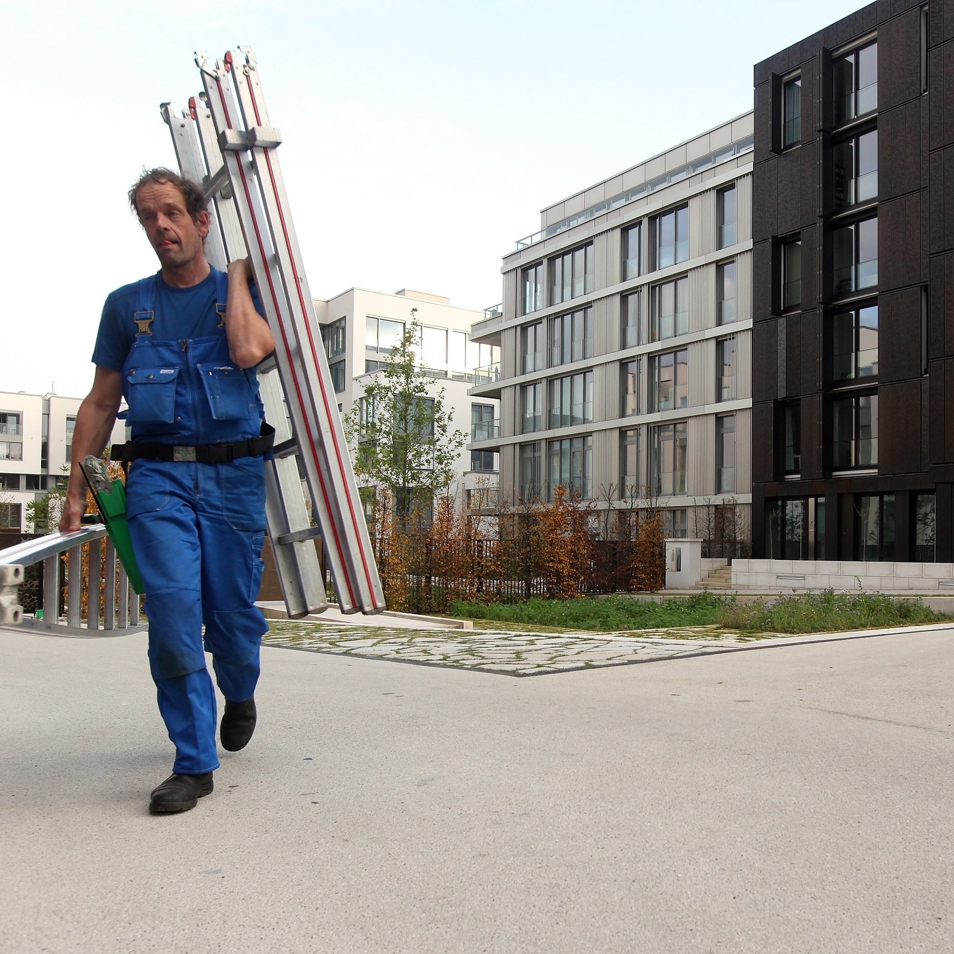 A worker walks through a new housing complex in Berlin. German and foreign investors are rapidly buying up property, leaving some analysts concerned about a potential housing bubble.