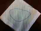 This napkin drawing shows a map of Honduras. The dot is where a brand new city would be built, free of the country's ills.