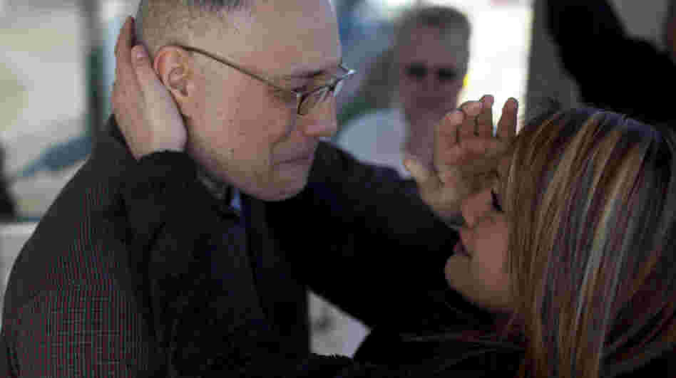 Ernie Lopez hugs his daughter, Nikki Lopez. He was released from prison on March 2, 2012, in Amarillo, Texas, after serving nine years.