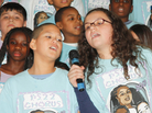 Group of kids singing. Group of kids singing.