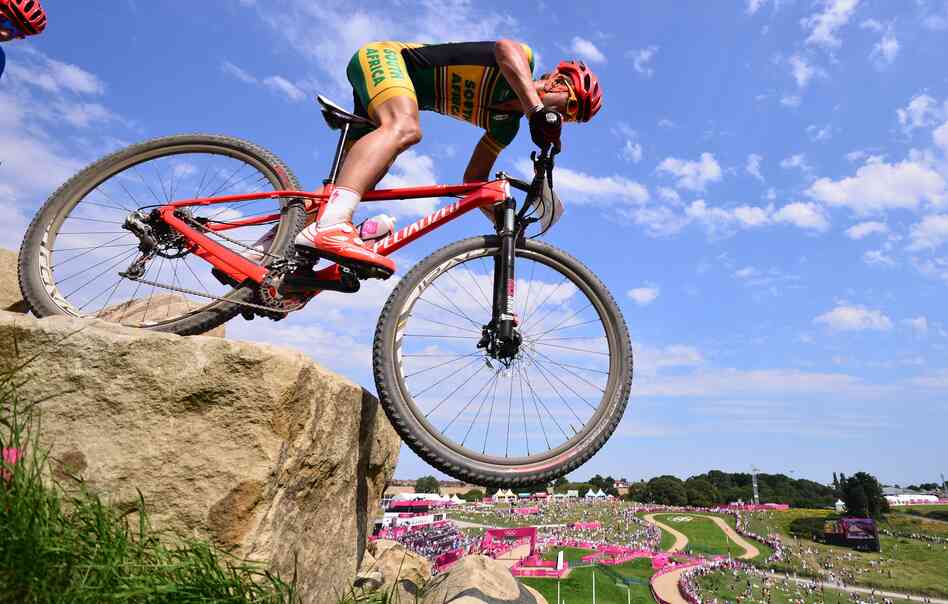 South African cyclist Burry Stander, seen here riding in the cross-country mountain bike race at the London Olympics, was killed during a training ride Thursday in South Africa.