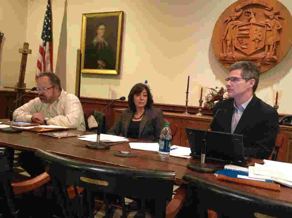 The three selectmen for the town of Weston, Conn., David Muller (left), Gayle Weinstein and Dennis Tracey, hold a town meeting in which they discuss a proposed gun-control ordinance.