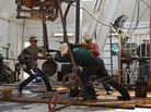 Men hard at work in oil-booming North Dakota. Men hard at work in oil-booming North Dakota.