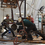 Men hard at work in oil-booming North Dakota.