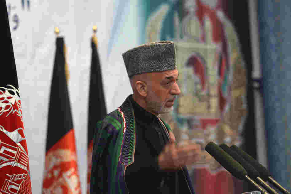 Afghan President Hamid Karzai will meet with President Obama and other senior U.S. officials in Washington this week. Many analysts remain skeptical about the prospects for a negotiated peace in Afghanistan. He's shown here speaking in Kabul last month.