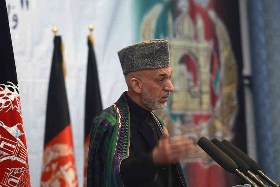 Afghan President Hamid Karzai will meet with President Obama and other senior U.S. officials in Washington this week. Many analysts remain skeptical about the prospects for a negotiated peace in Afghanistan. He's shown here speaking in Kabul last month.