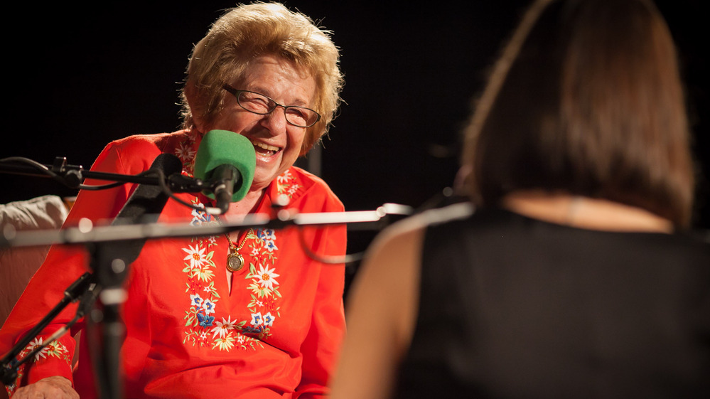 Dr. Ruth and Ask Me Another host Ophira Eisenberg crack each other up. Their conversation--covering sex and love in the 21st century, monogamy and a certain sexy novel--might crack you up, too.